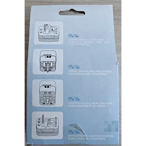 Foto do aviso oficial: Universal travel adapter Adaptador de viagem — risco: Choque elétrico