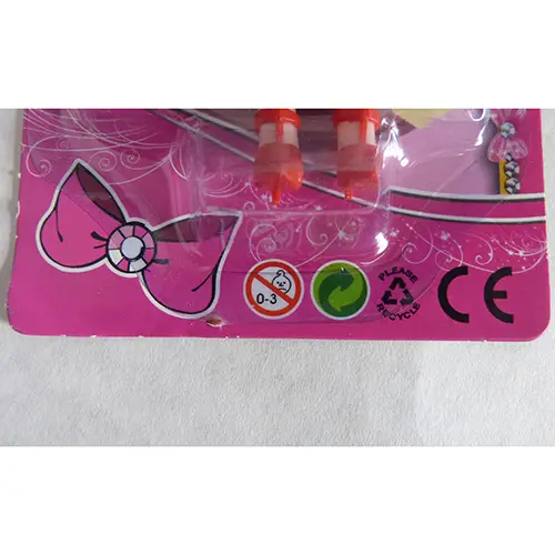 Foto do aviso oficial: Dress Girls játék baba Boneca de plástico — risco: Químico