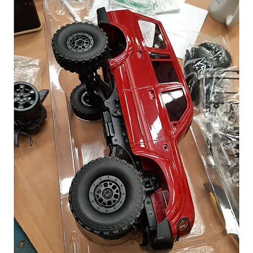 Foto uit de officiële melding: 1/16 Scale RC Cr,, Adults Hobby Toy (Red) New 1/16 Radiogestuurde speelgoedauto — risico: Snijwonden