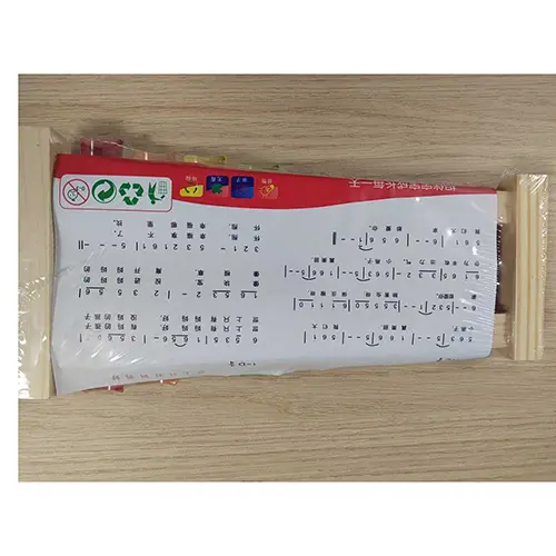 Photo from the official notice: Hand knocks the xylophone musical toy — choking risk