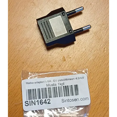 Foto do aviso oficial: Adaptador de viagem — risco: Choque elétrico (SR/04059/25)