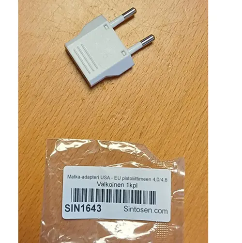 Foto do aviso oficial: Adaptador de viagem — risco: Choque elétrico (SR/04059/25)