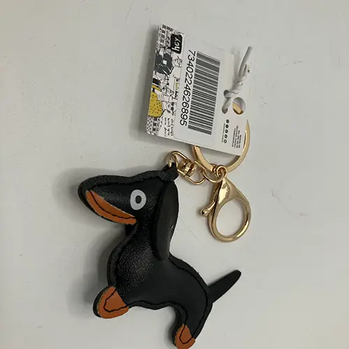 Photo de l’avis officiel: Mobello Mobile charm dog Porte-clés — risque: Risque chimique & Environnement