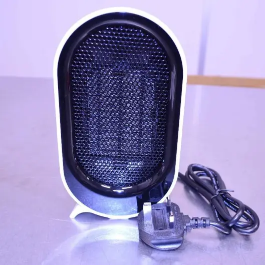 Foto uit de officiële melding: Warm Air Blower Ventilatorverwarming — risico: Brand