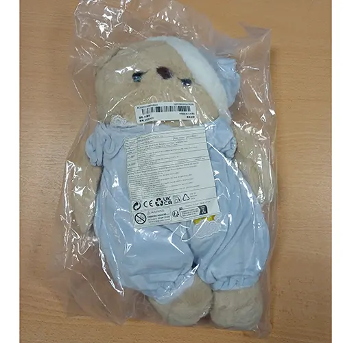 Photo de l’avis officiel: Jouet en peluche en forme d'ours mignon, pourpée en forme d'ours mignon avec vêtements de couchage Jouet soupl — risque: Étouffement
