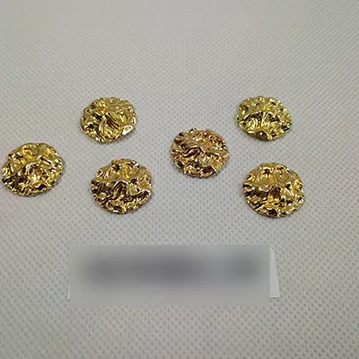 Photo de l’avis officiel: Metal pendant circle gold (B89) Pendentif — risque: Risque chimique