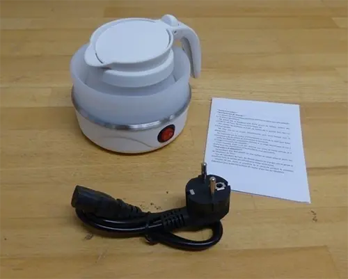Photo from the official notice: Travel electric kettle — electric shock risk