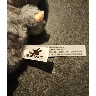 Photo from the official notice: Pop Mart (COUNTERFEIT) The monsters - Big into Energy Series (counterfeit) soft toy — choking risk