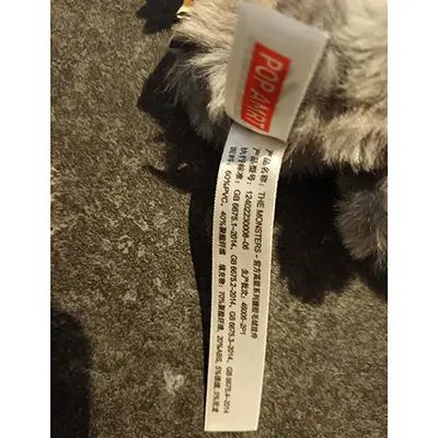 Photo from the official notice: Pop Mart (COUNTERFEIT) The monsters - Big into Energy Series (counterfeit) soft toy — choking risk