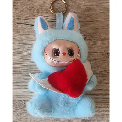 Photo from the official notice: Pop Mart (COUNTERFEIT) THE MONSTERS SPRING WILD AT HOME SERIES SUGAR GLUE PLUSH DOLL PENDANTT soft toy — choking risk
