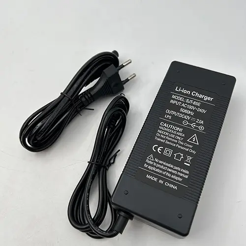 Photo from the official notice: 36V 2A elektrisk scooter oplader universal elektrisk cykel strømadapter oplader DC5,5x2,1mmYMQX) adaptor — fire risk