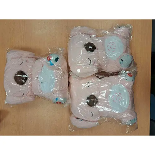 Photo from the official notice: Ours en peluche Teddy respirant rose soft toy — choking risk