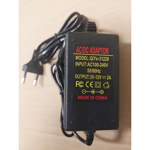 Foto aus der offiziellen Meldung: Adaptateur d'alimentation réglable AC 220V 110V à DC 3V 9V 12V 24V 36V, adaptateur universel 220 110 Adapter — Risiko: Elektrischer Schlag