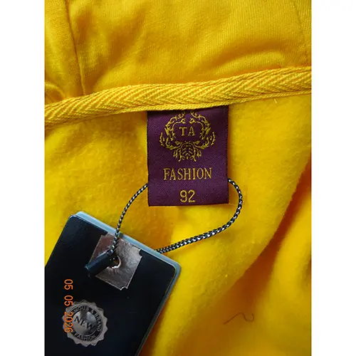 Foto aus der offiziellen Meldung: TA Fashion Kinder Hoodie — Risiko: Strangulierung