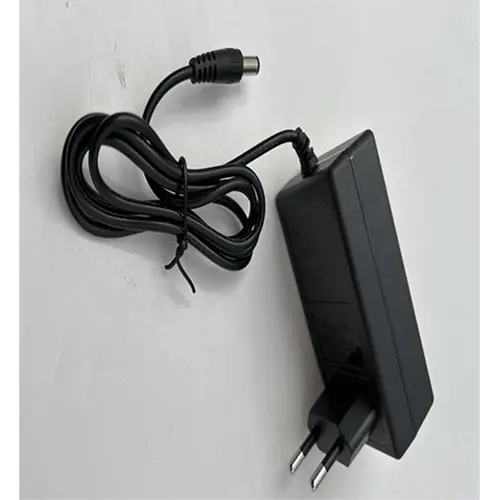Foto uit de officiële melding: EU/US Plug 12.6V 2A AC Charger Lithium Battery Lithium Adapter — risico: Elektrische schok