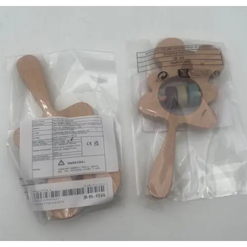 Photo from the official notice: New Wooden Hand Rattle toy rattle — choking risk