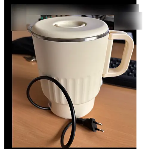 Foto dell’avviso ufficiale: Stainless Steel Travel Electric Kettle Bollitore elettrico — rischio: Ustioni & Scossa elettrica