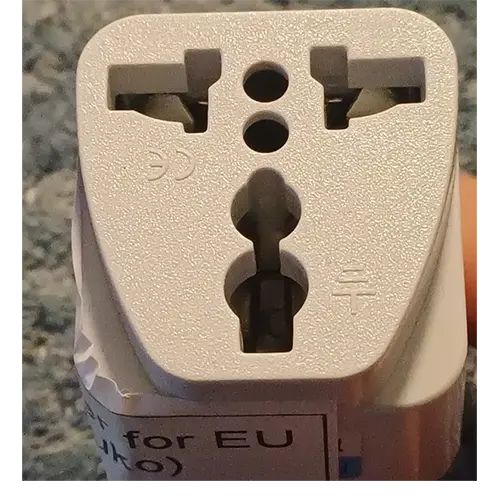 Foto aus der offiziellen Meldung: Travel Adapter for EU Reiseadapter — Risiko: Elektrischer Schlag