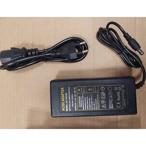 Foto aus der offiziellen Meldung: Alimentation universelle 12V DC, 12V 5V 6V 9V 10V 15V 24V 1A 2A 3A 5A 6A 8A, transformateur AC 220V. Ladegerät — Risiko: Elektrischer Schlag