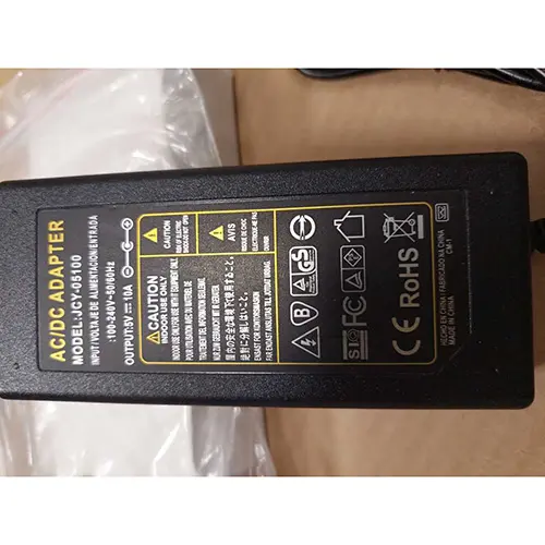 Foto aus der offiziellen Meldung: Alimentation universelle 12V DC, 12V 5V 6V 9V 10V 15V 24V 1A 2A 3A 5A 6A 8A, transformateur AC 220V. Ladegerät — Risiko: Elektrischer Schlag