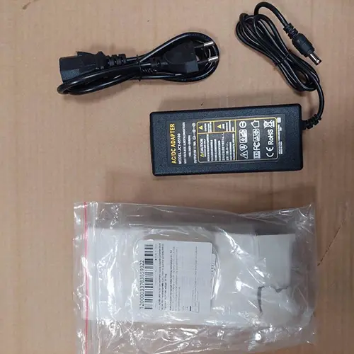 Foto aus der offiziellen Meldung: Alimentation universelle 12V DC, 12V 5V 6V 9V 10V 15V 24V 1A 2A 3A 5A 6A 8A, transformateur AC 220V. Ladegerät — Risiko: Elektrischer Schlag