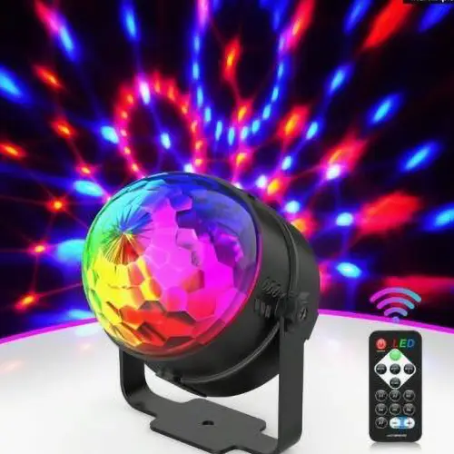 Photo from the official notice: Mini lumière disco LED RGB rotative à 360 degrés, télécommande et contrôle musical, éclairage de scè disco lig — electric shock risk