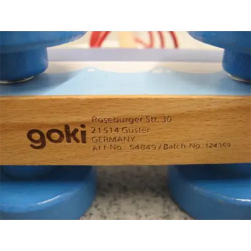 Photo from the official notice: Goki Pull-along ship with bead maze wooden toy — strangulation risk