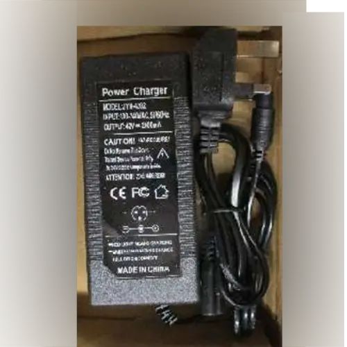 Photo from the official notice: XINZHIZHU 42V 2A charger — electric shock & fire risk