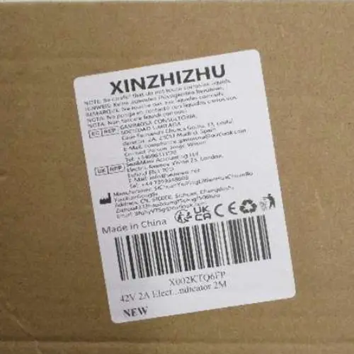 Photo from the official notice: XINZHIZHU 42V 2A charger — electric shock & fire risk