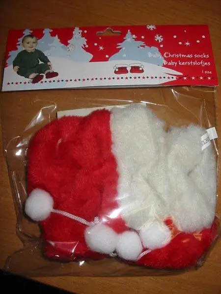 Photo from the official notice: Babies' Christmas Socks babies' bootees — choking risk