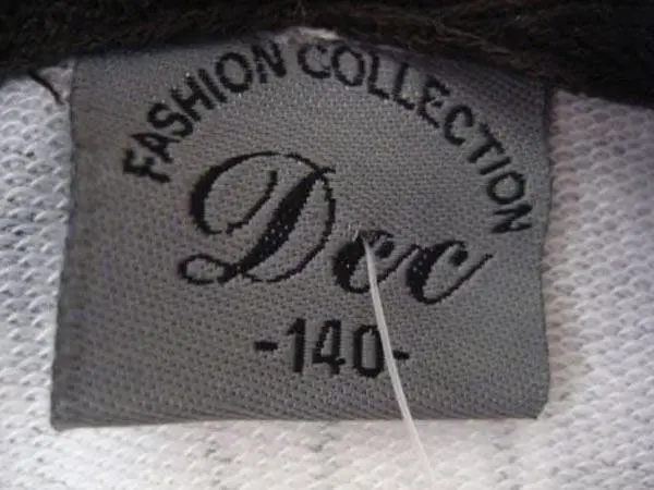 Foto uit de officiële melding: DCC Kinderkleding — risico: Verwurging