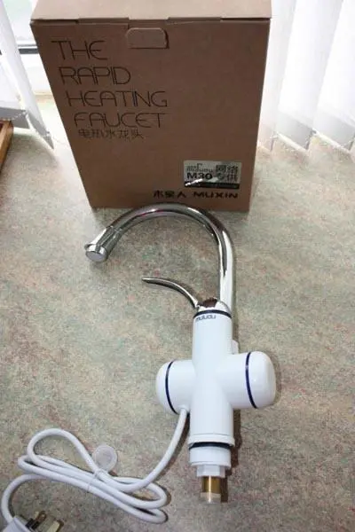 Photo de l’avis officiel: Muludu The Rapid Heating Faucet Robinet électrique de chauffe-eau/mélangeur — risque: Choc électrique