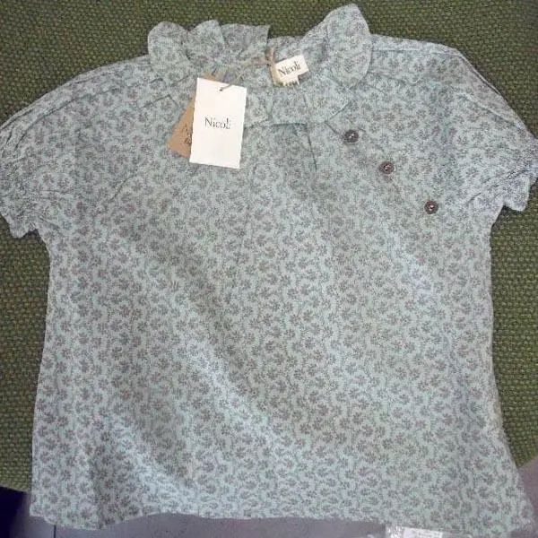 Foto do aviso oficial: Niooli Wooden Buttons BB Shirt Blusas para bebés — risco: Engasgamento