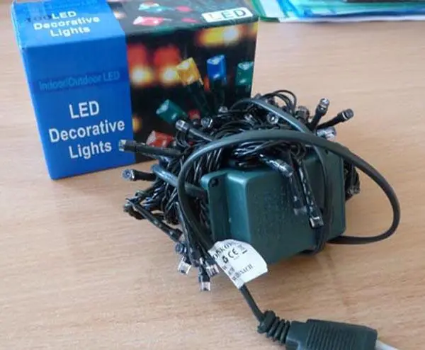 Photo de l’avis officiel: 100 LED Decorative Lights Chaîne d’éclairage — risque: Choc électrique (A12/0411/15)