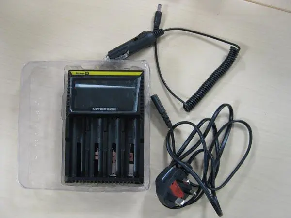 Photo from the official notice: Nitecore (COUNTERFEIT PRODUCT) Digi Charger D4 (COUNTERFEIT PRODUCT) battery charger — electric shock risk