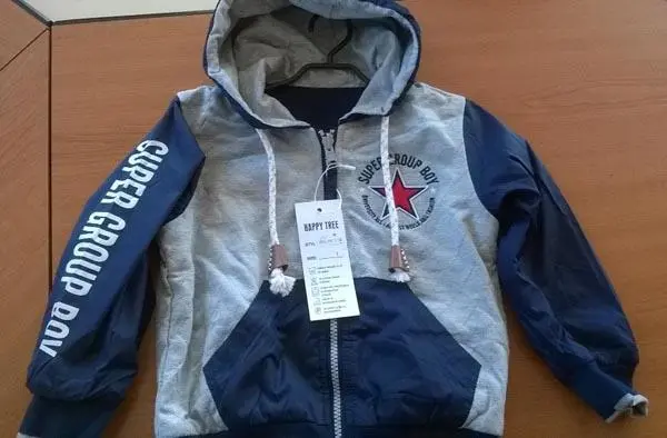 Foto aus der offiziellen Meldung: Happy Tree Kinder-Sweatshirt — Risiko: Strangulierung