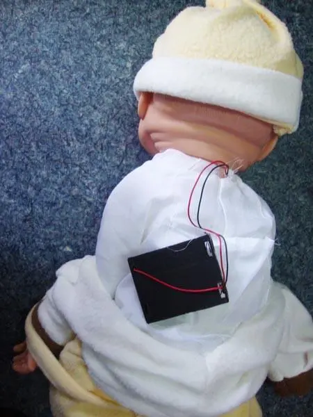 Foto do aviso oficial: NIDA Bobas "Happy Baby" Boneca de plástico — risco: Engasgamento