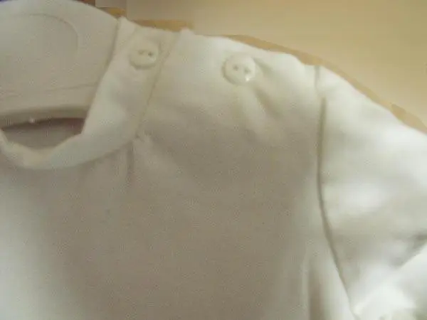 Photo from the official notice: GSG babies' clothes — choking risk