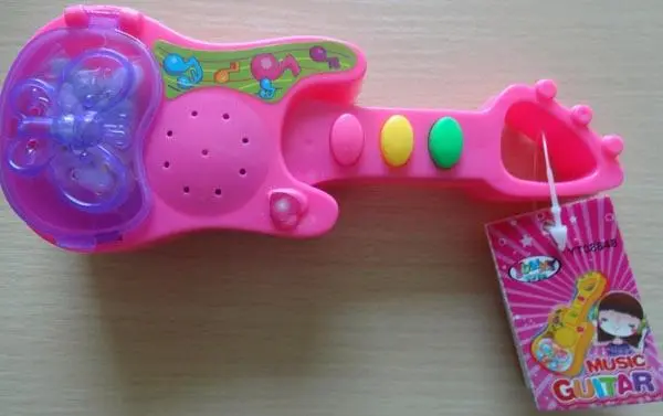 Photo de l’avis officiel: Yummy Toys Music GUITAR Instrument de musique jouet — risque: Étouffement