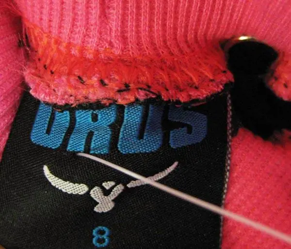 Foto uit de officiële melding: URUS Kinderbroeken — risico: Verwonding