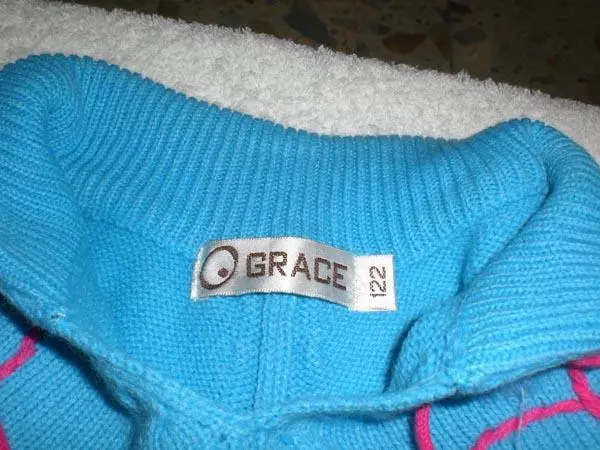 Photo de l’avis officiel: Grace Poncho des filles — risque: Etranglement