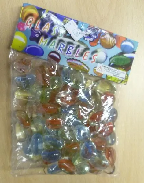 Foto aus der offiziellen Meldung: GLASS MARBLES Dekorative Glassteine — Risiko: Ersticken