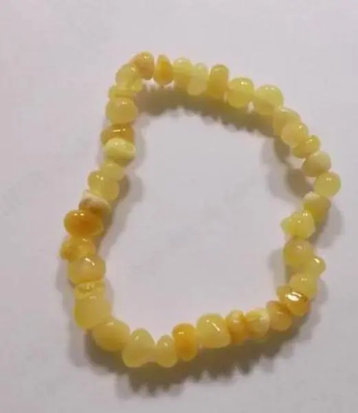 Foto aus der offiziellen Meldung: Darra Bernsteinschmuck für Kinder — Risiko: Ersticken