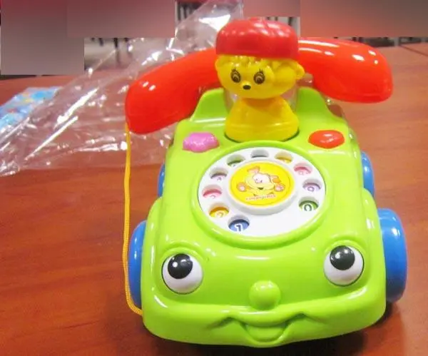 Foto do aviso oficial: bionyi Pull-along telefone do brinquedo — risco: Engasgamento & Estrangulamento