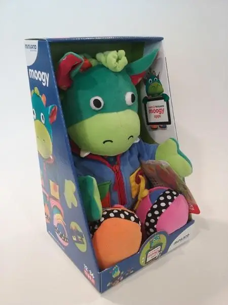 Foto do aviso oficial: Miniland Educational Moogy Fastening Doll Brinquedo de peluche — risco: Engasgamento