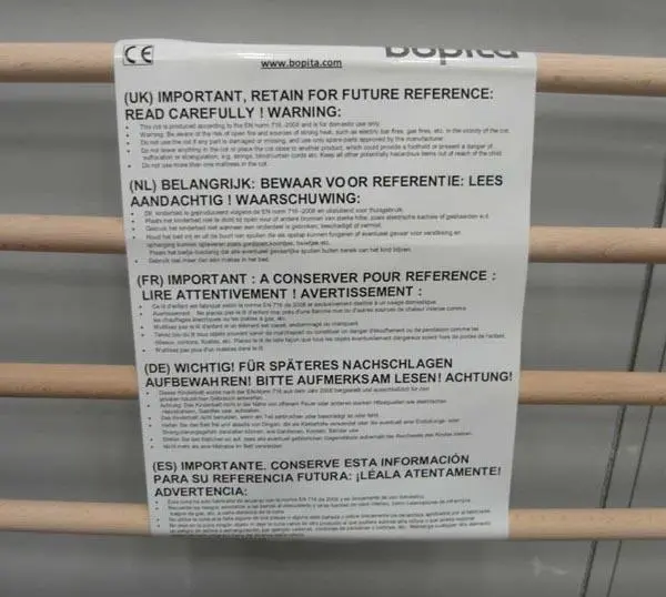 Photo from the official notice: Bopita Ledikant Finn cot — strangulation risk