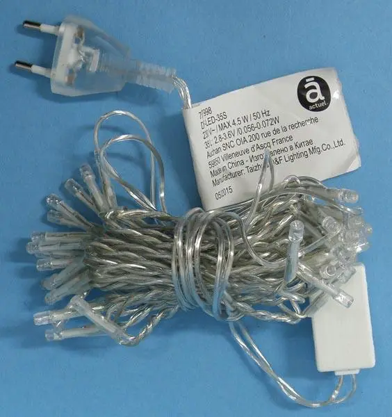 Foto uit de officiële melding: Actuel - Auchan 35 LED** Lampes fixes Verlichtingsketting — risico: Elektrische schok