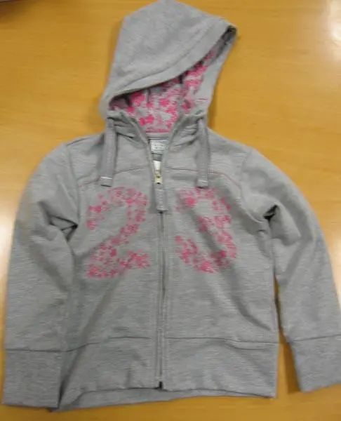 Foto do aviso oficial: Brugi Pijama infantil — risco: Estrangulamento