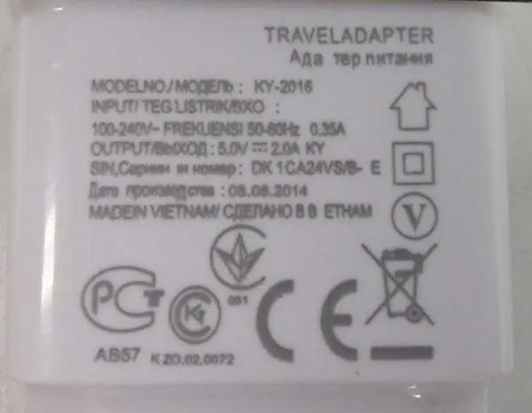 Photo de l’avis officiel: Travel Adapter Chargeur USB — risque: Choc électrique & Incendie (A12/1319/16)