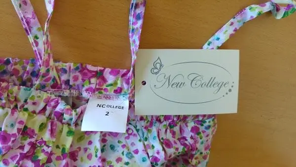 Photo de l’avis officiel: New College Robe de fille — risque: Etranglement